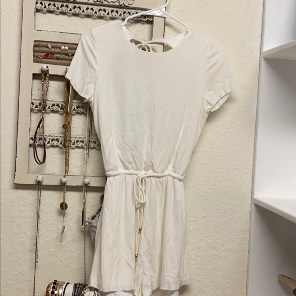 Open back white romper by super down